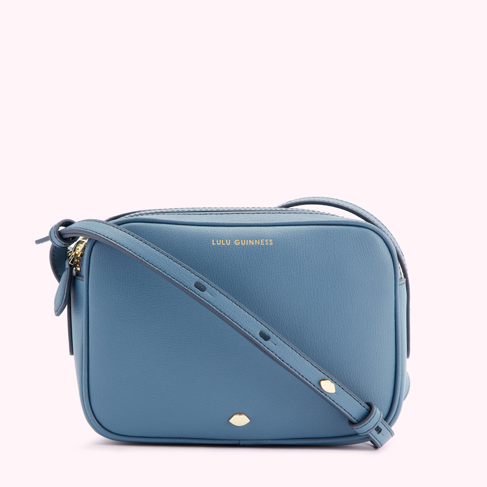 Dusty blue Lulu Guinness crossbody bag.