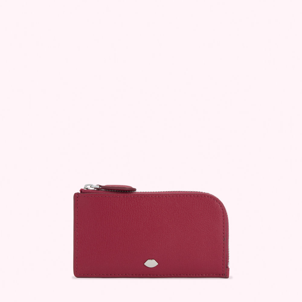 Crimson leather zip-around cardholder with a small silver logo.