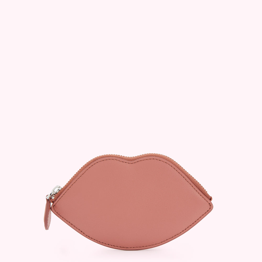 Pink leather lip-shaped coin purse with silver zipper.