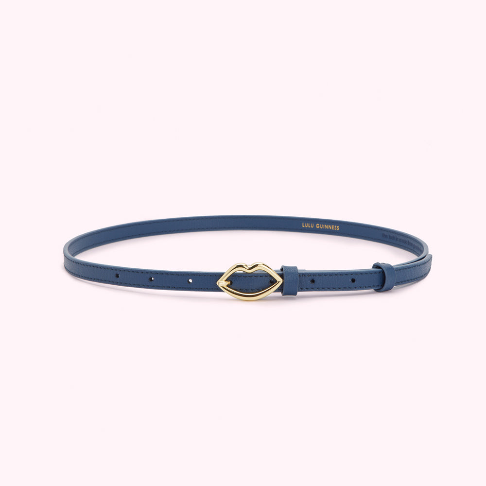 Dark blue leather Lulu Guinness belt with a gold lip-shaped buckle.