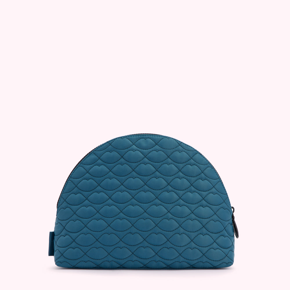 Teal quilted makeup bag with lip print.