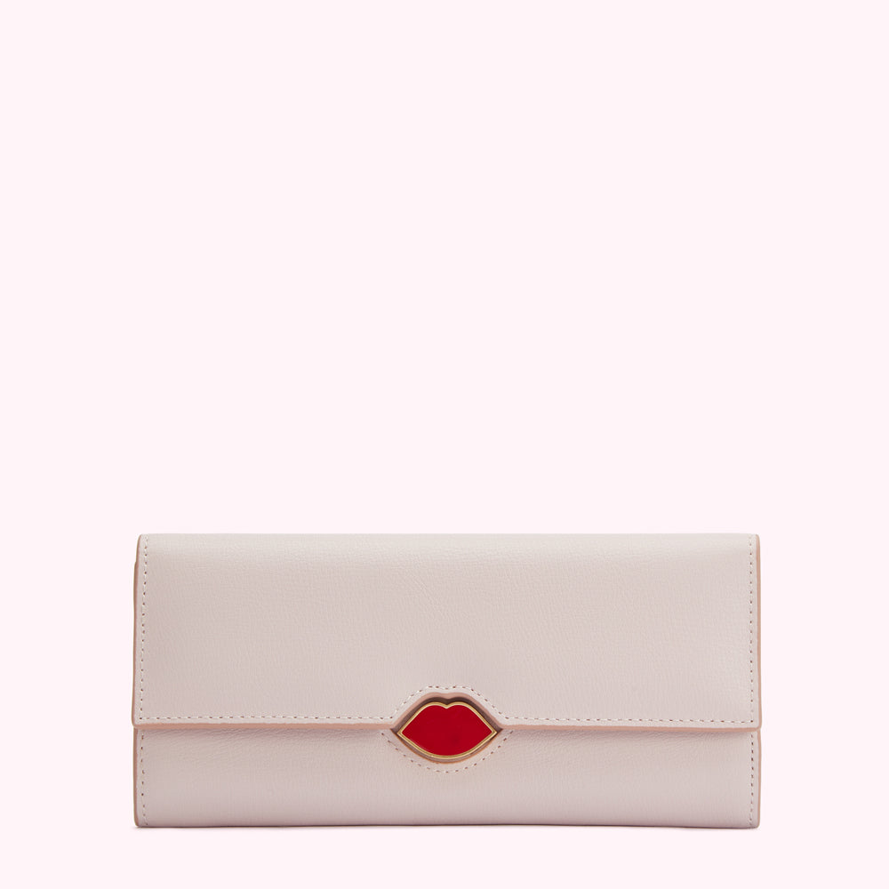 Pale pink leather wallet with a red lip emblem.