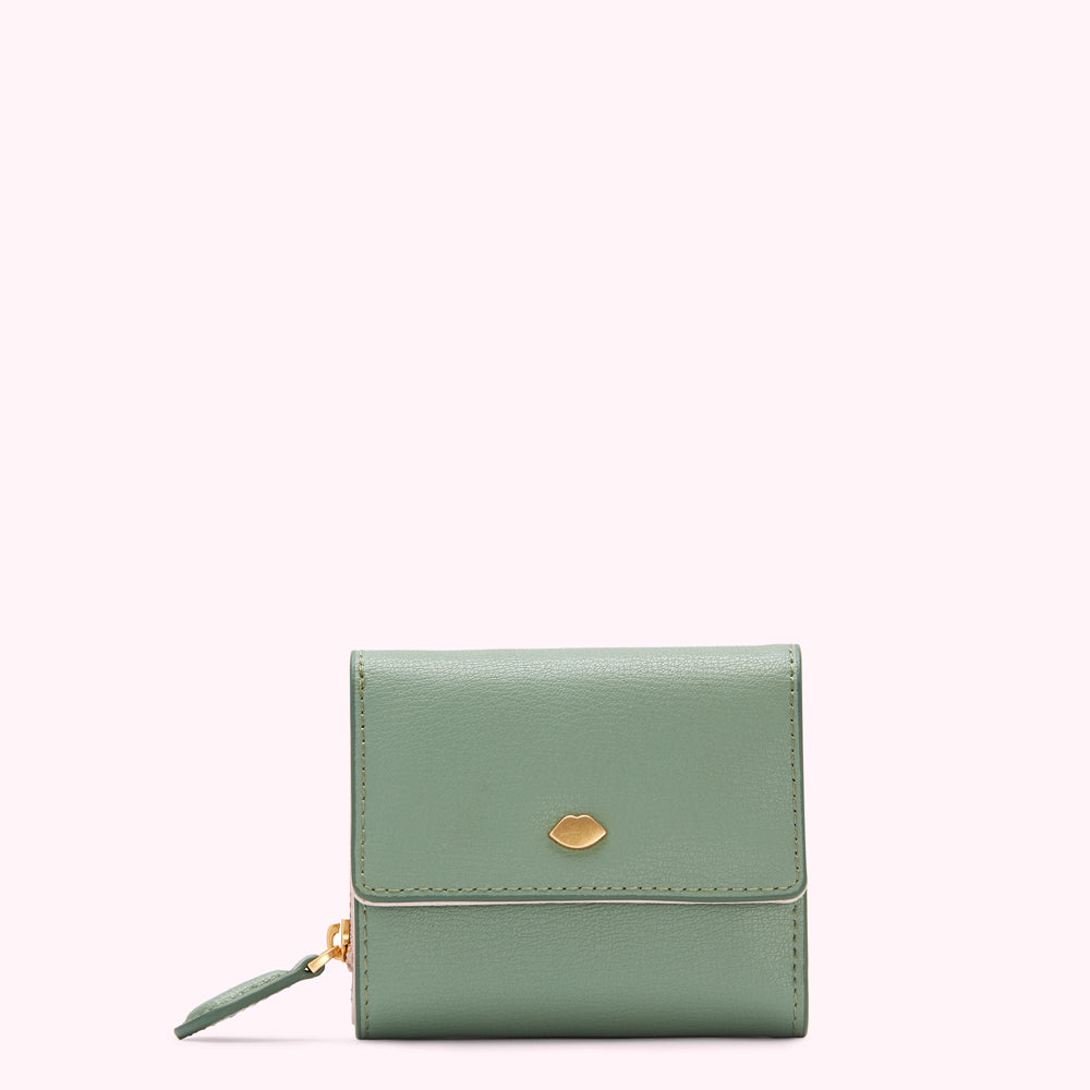 Sage green leather wallet with gold lip emblem.