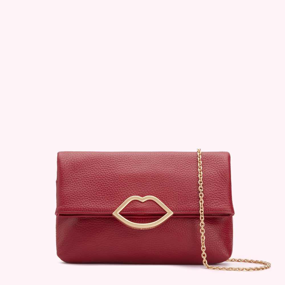 Red leather crossbody bag with gold lip-shaped clasp and chain strap.
