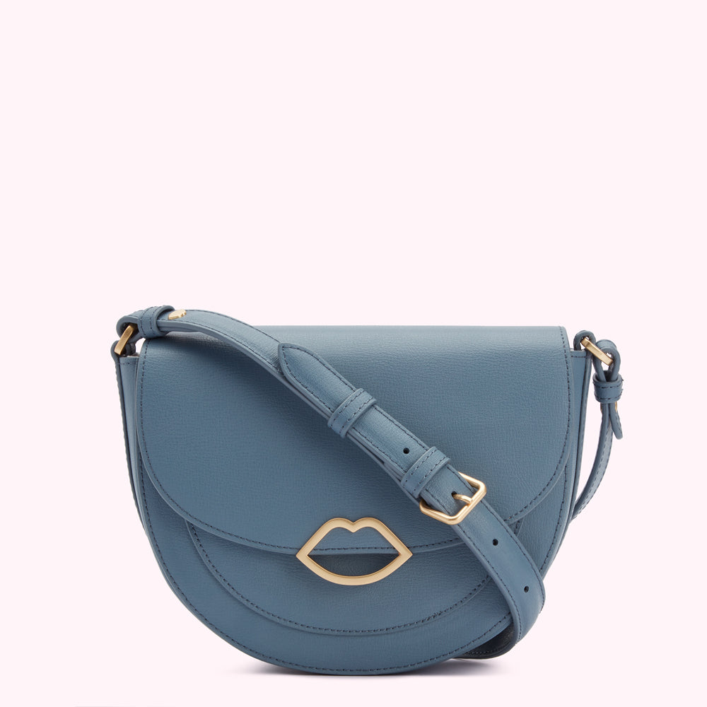 Dusty blue half-moon crossbody bag with gold lip detail.