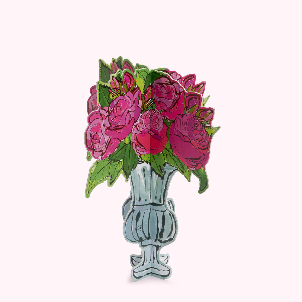 A pop-up card depicting a bouquet of pink roses in a light blue urn.