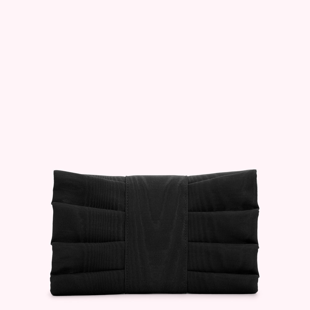Black pleated clutch on a white background.
