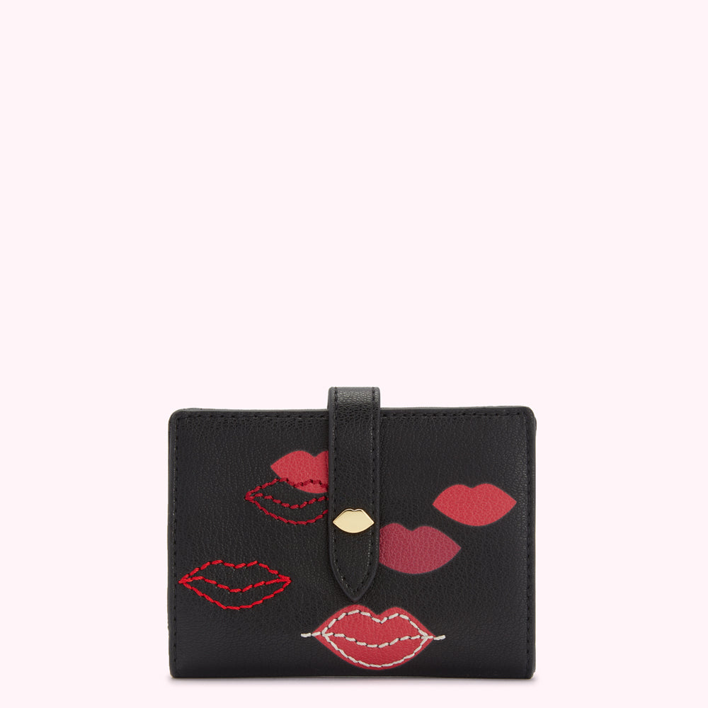Black leather wallet with red and pink lips design.

