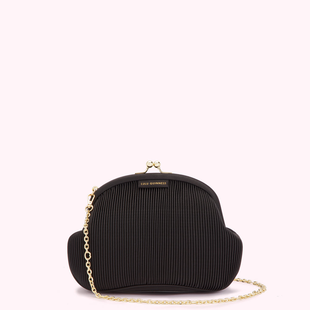 Black pleated Lulu Guinness purse with gold chain strap.
