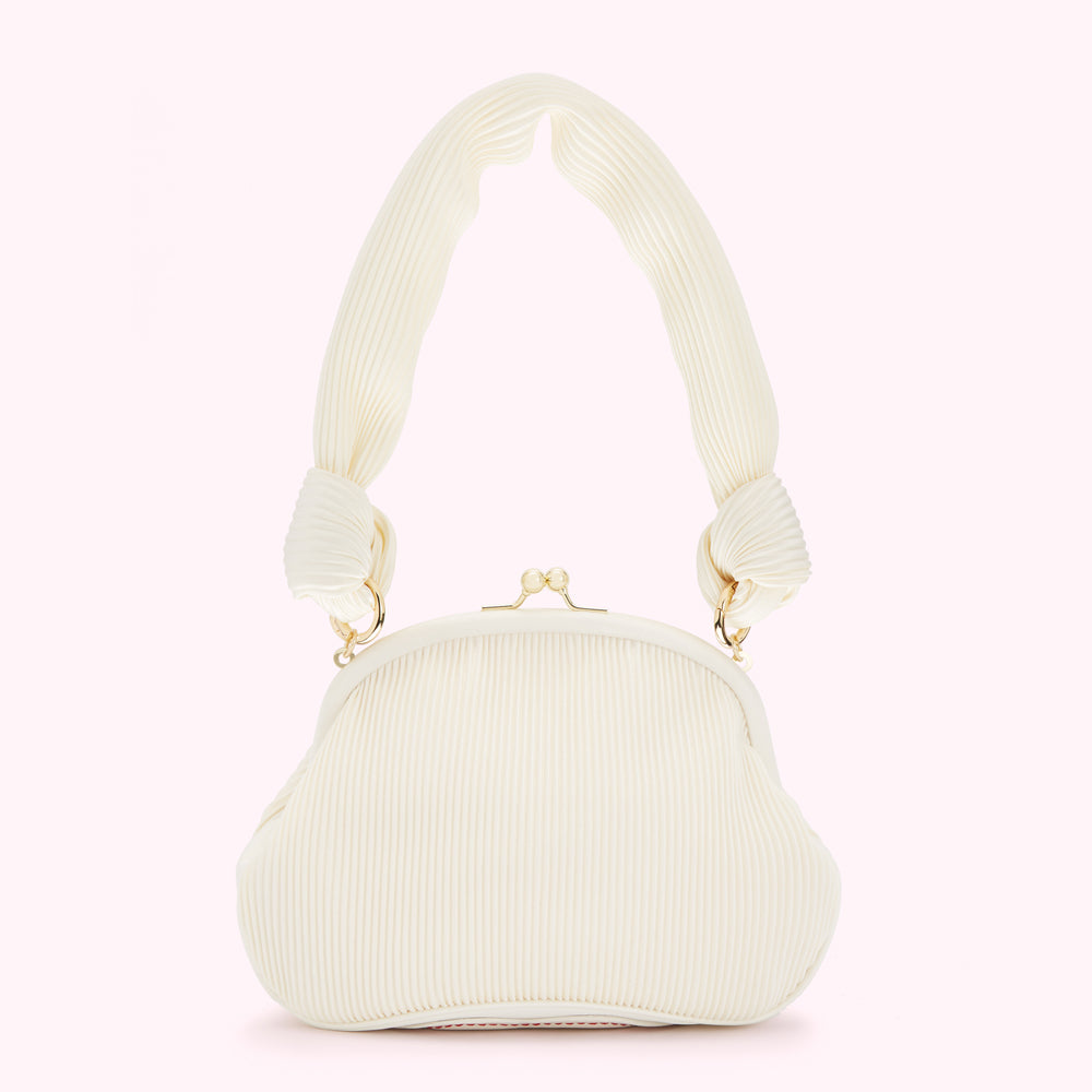 Off-white pleated handbag with knotted handles and gold clasp.
