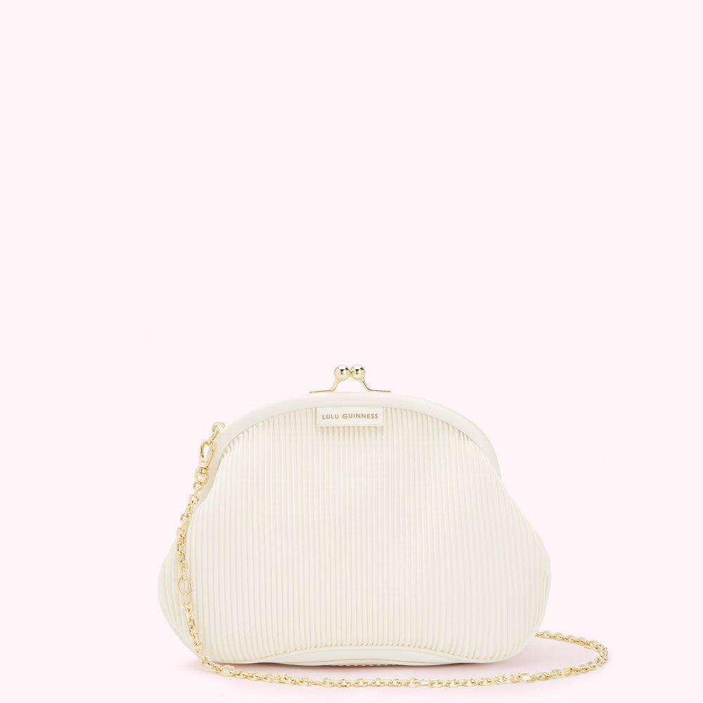 Off-white Lulu Guinness pleated crossbody bag with gold chain strap and clasp.
