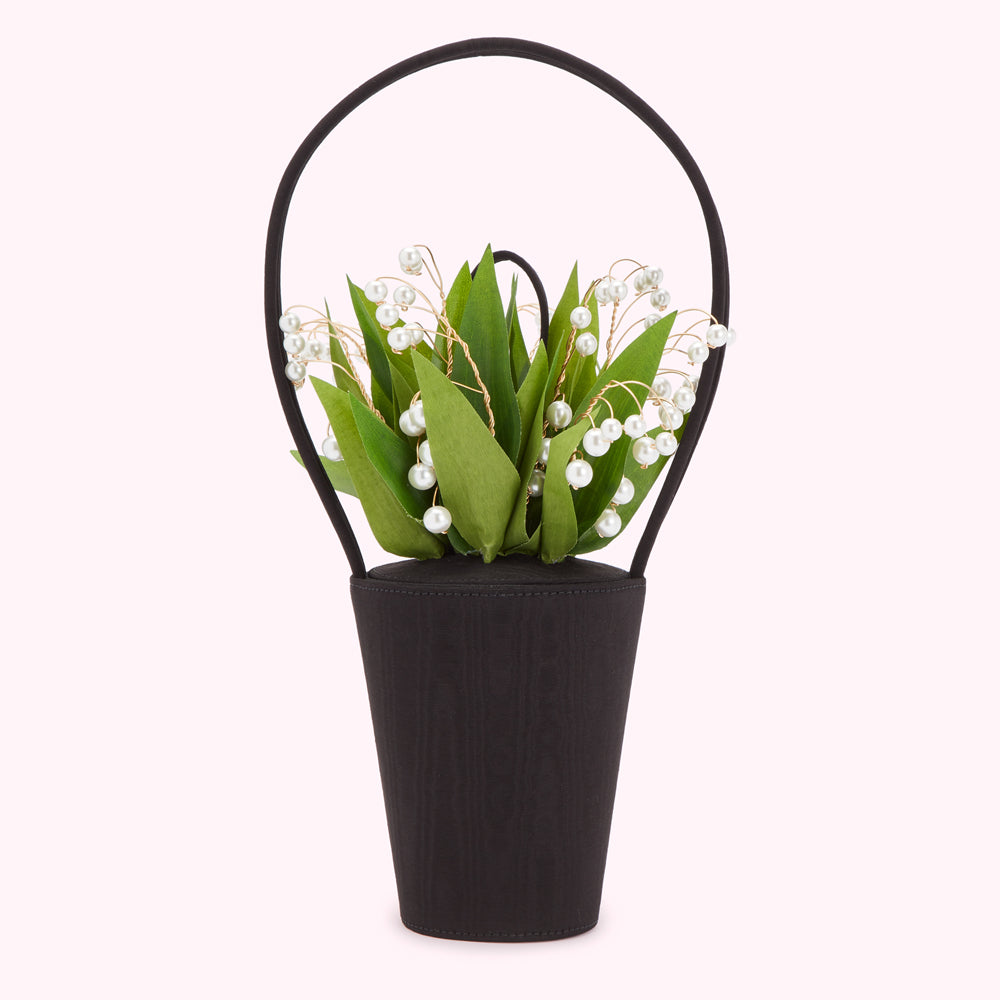 Grab 25% off at Lulu Guinness 5 Black handbag shaped like a vase with a bouquet of lilies of the valley and pearls.