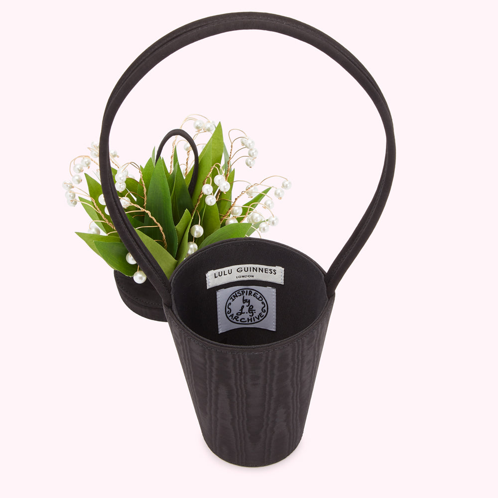 Black Lulu Guinness Lily of the Valley bucket bag with pearl embellishments.
