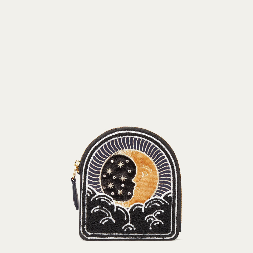Coin purse with celestial design featuring a moon and stars on a white background