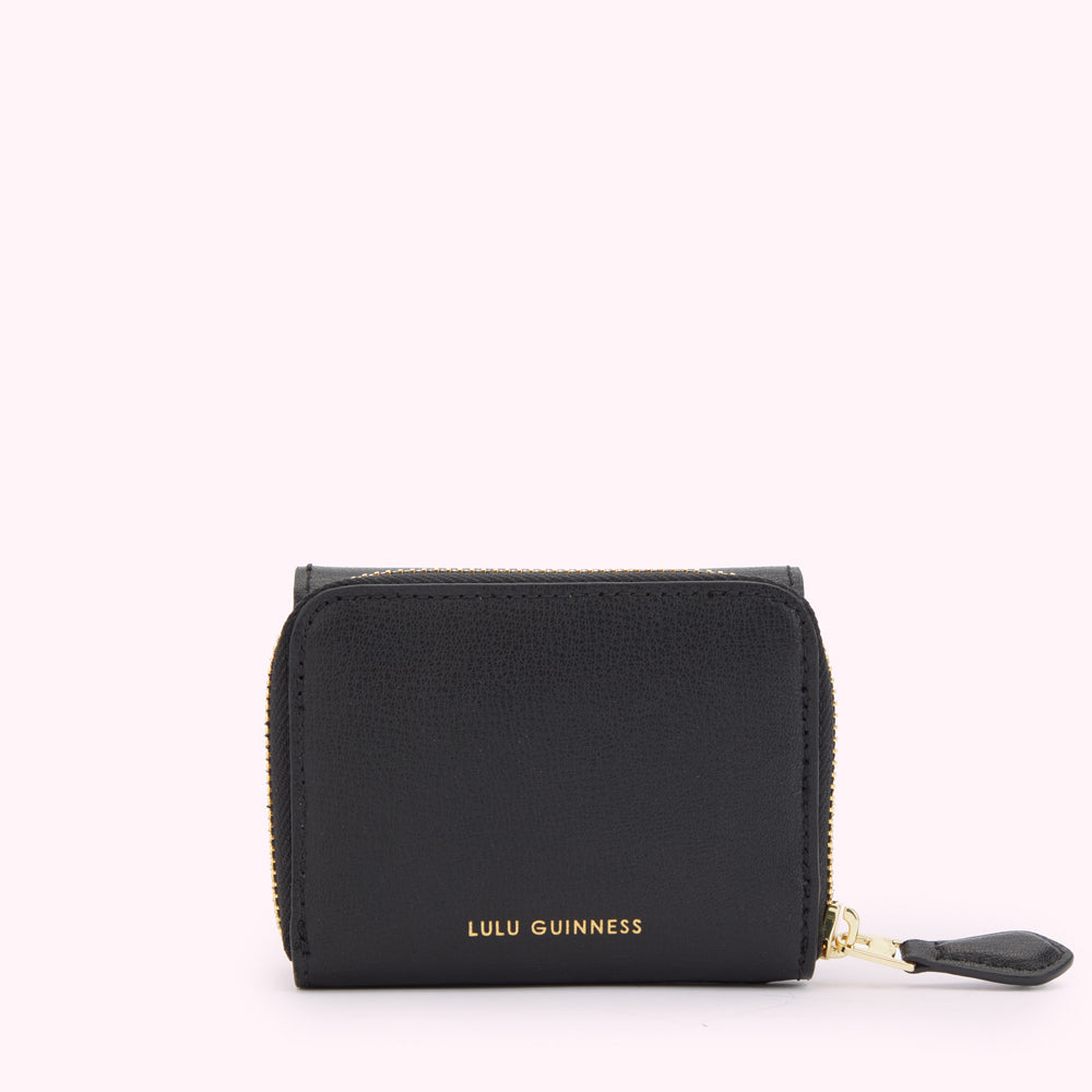 Back image of a black leather wallet with a gold zipper and gold foil print 'Lulu Guinness' logo.