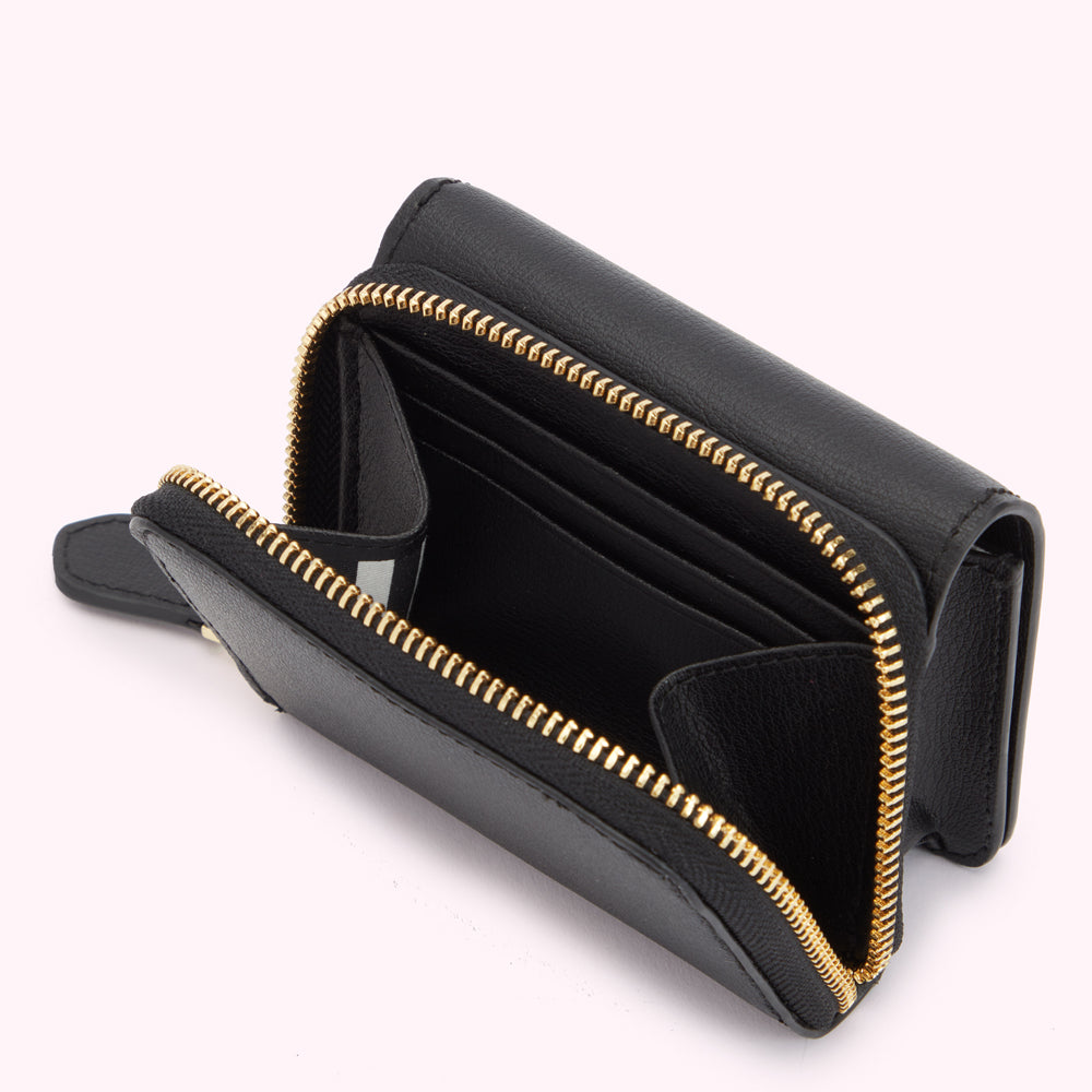 Inside image of a black leather wallet with gold zipper showing the inside pocket with card slots.