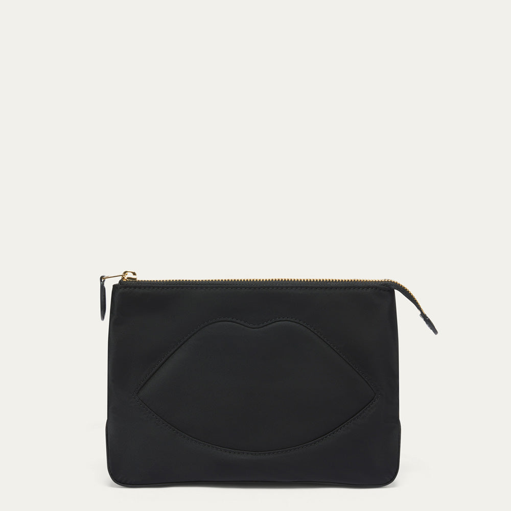 A black nylon pouch with a gold zipper and a large lip-shaped cutout on the front, shown against a plain off-white background.