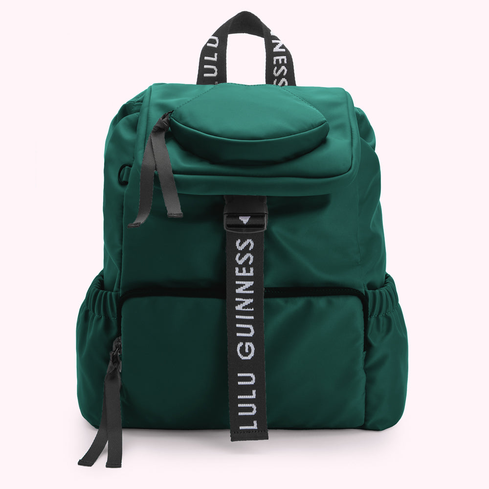 Green Lulu Guinness backpack with black straps and logo.