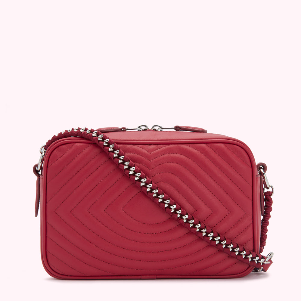 Red quilted leather crossbody bag with silver chain strap.