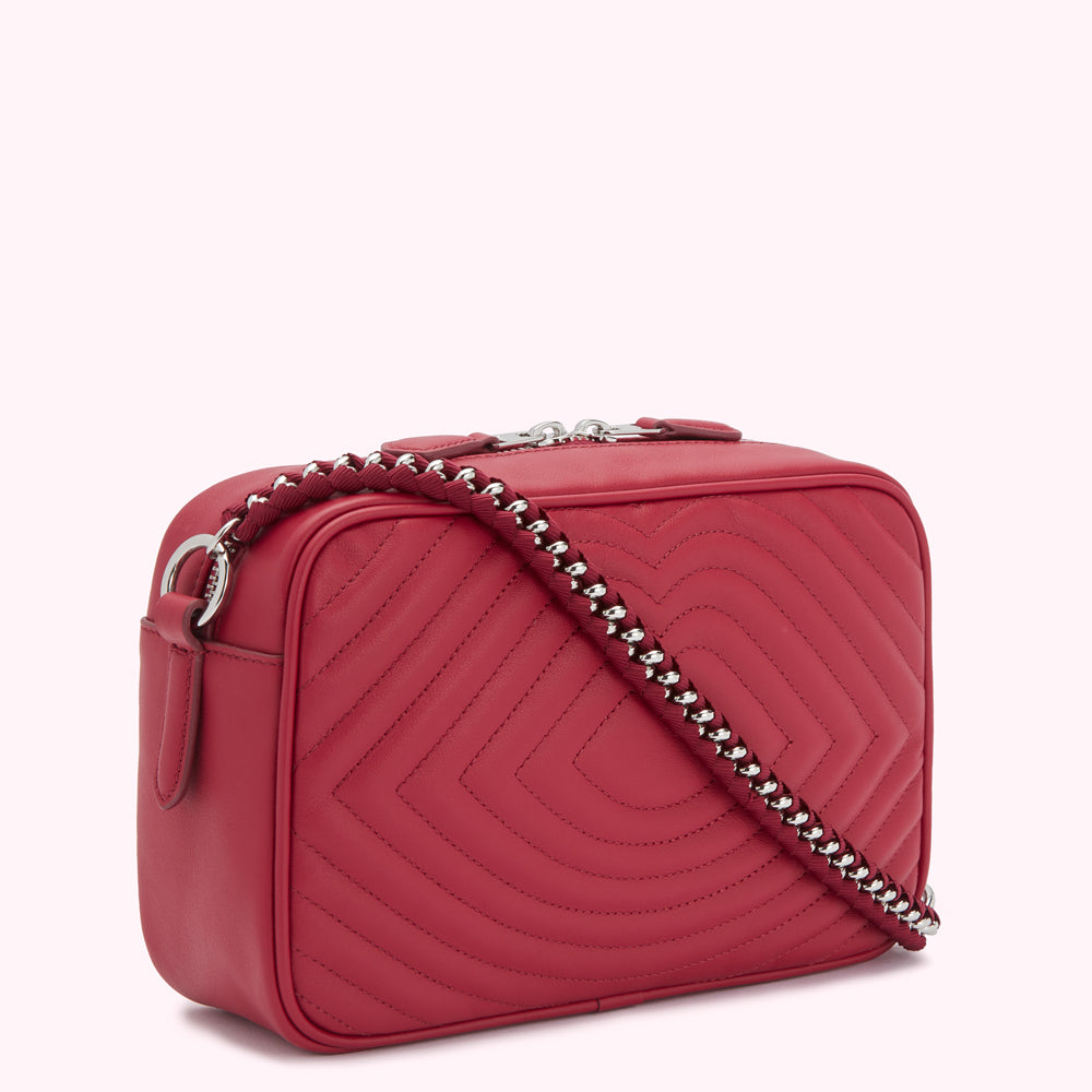 Red quilted leather crossbody bag with silver chain strap.
