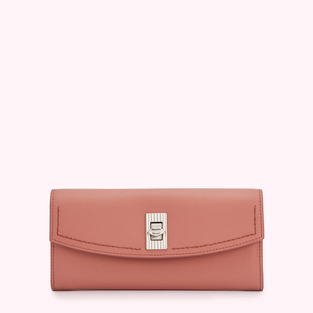 Dusty rose leather wallet with silver clasp.
