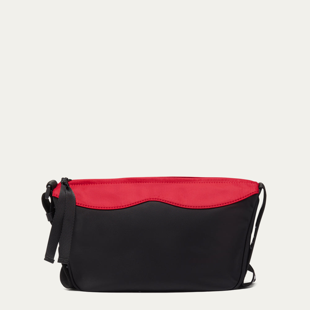 Black and red bag on a light gray background