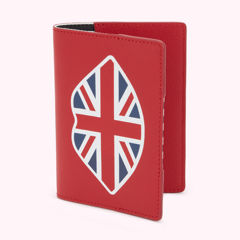 Front image of a red leather passport cover with a lip shaped union jack pattern on the front.