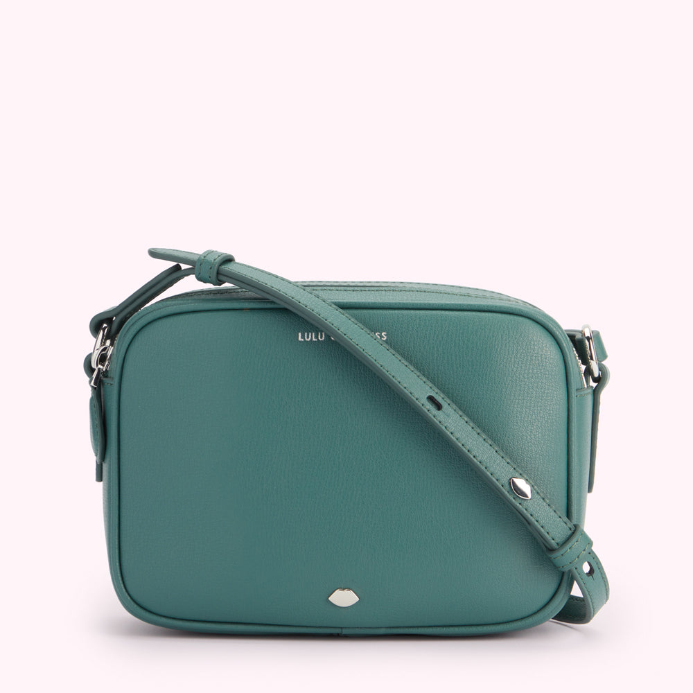 Teal Lulu Guinness crossbody bag with silver hardware.
