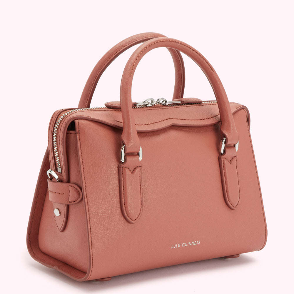 Dusty rose Lulu Guinness leather handbag with silver-toned hardware.
