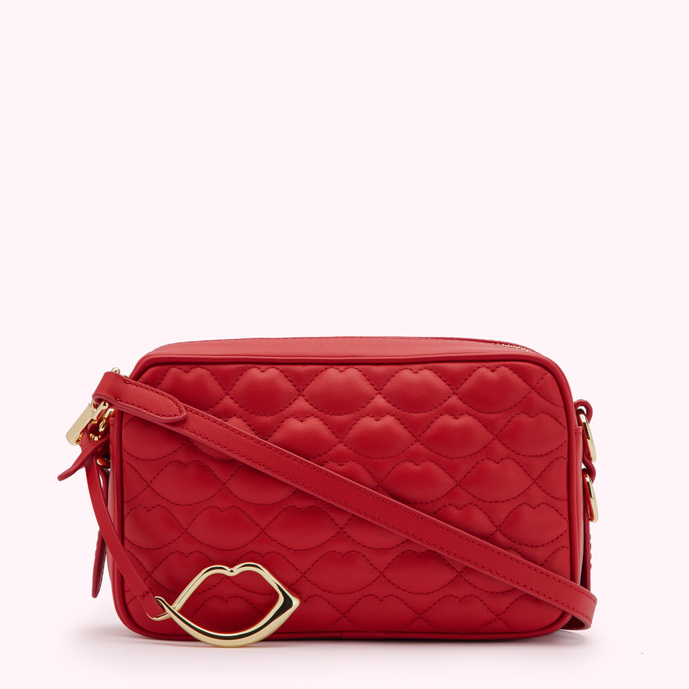 red crossbody quilted bag with golden lip