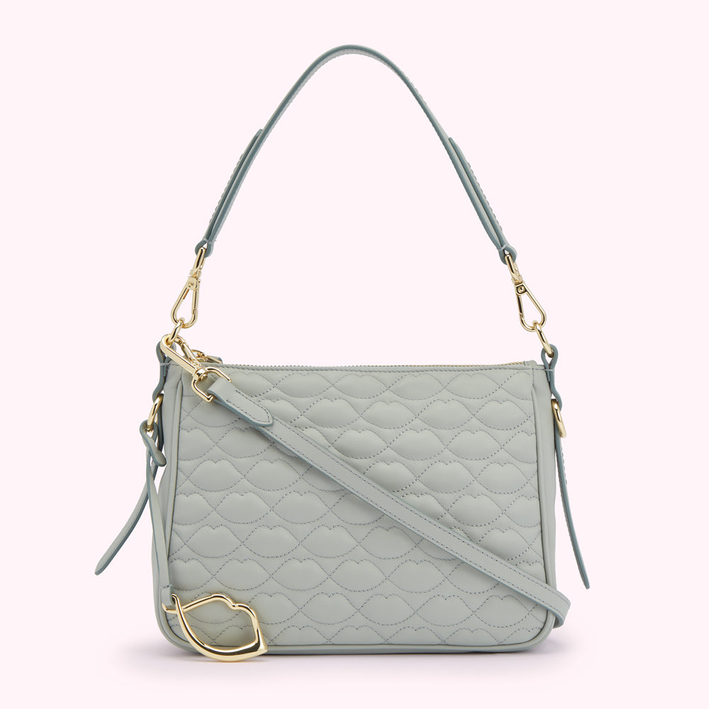 Light blue quilted shoulder bag with gold-toned hardware.