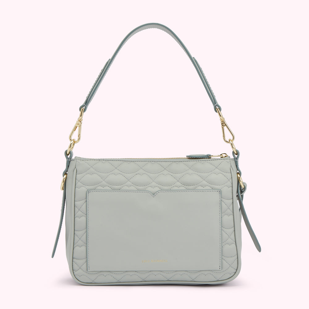 Light blue quilted shoulder bag with gold hardware.