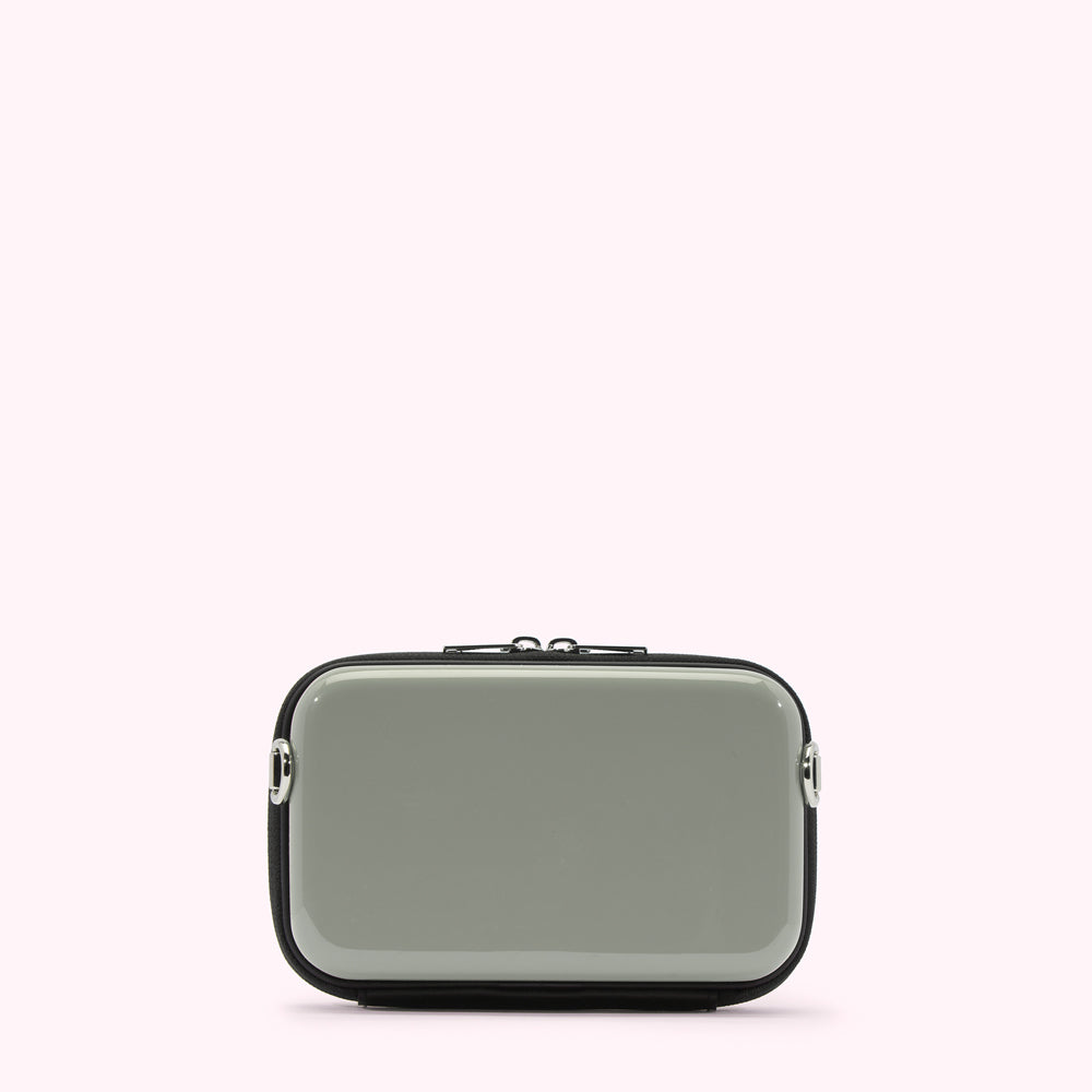 Sage green rectangular crossbody bag with black trim and silver zipper.

