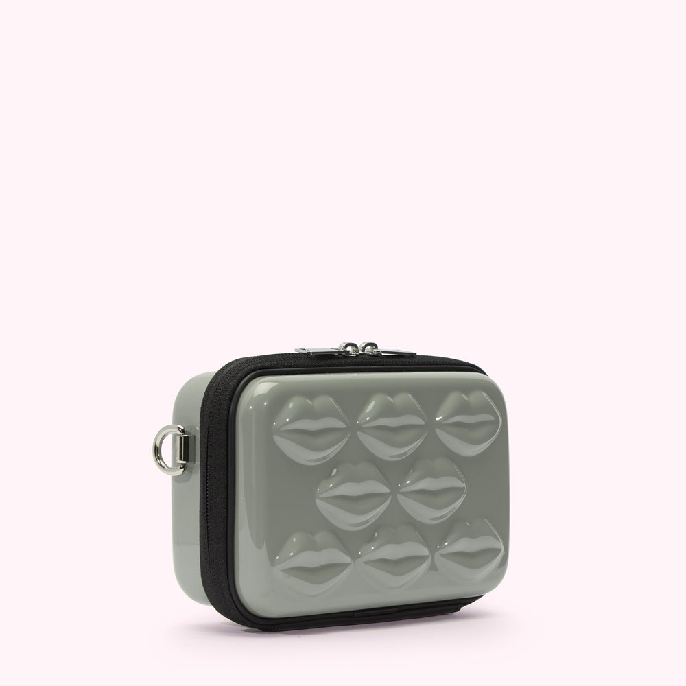 Sage green crossbody bag with embossed lips.