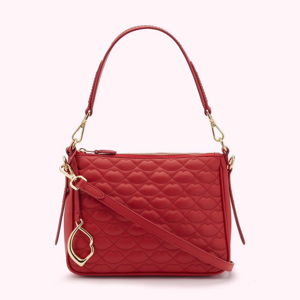 red quilted lips leather bag