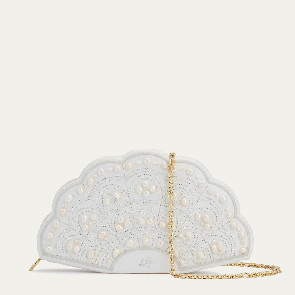 White beaded fan-shaped handbag with a gold chain on a white background