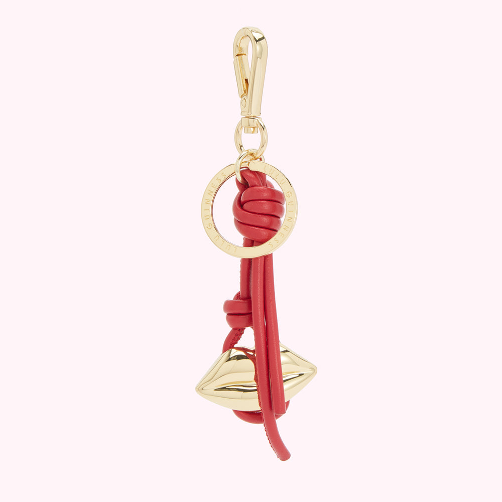 red keyring with golden lip