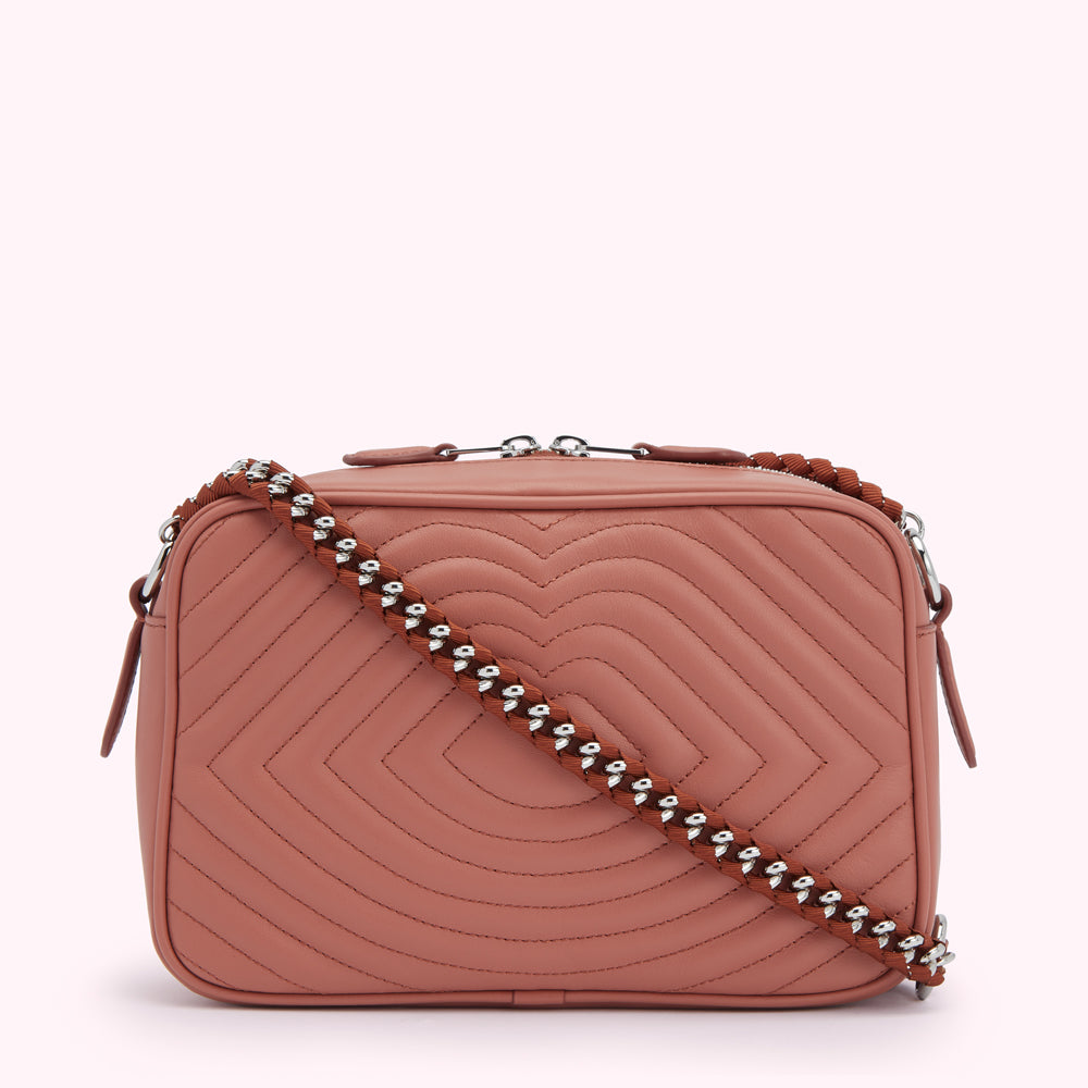 Dusty rose quilted leather crossbody bag with a silver and brown chain strap.
