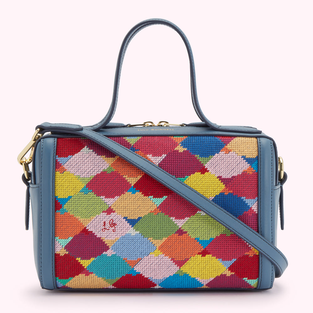 Blue leather Lulu Guinness handbag with a colourful needlepoint front panel.