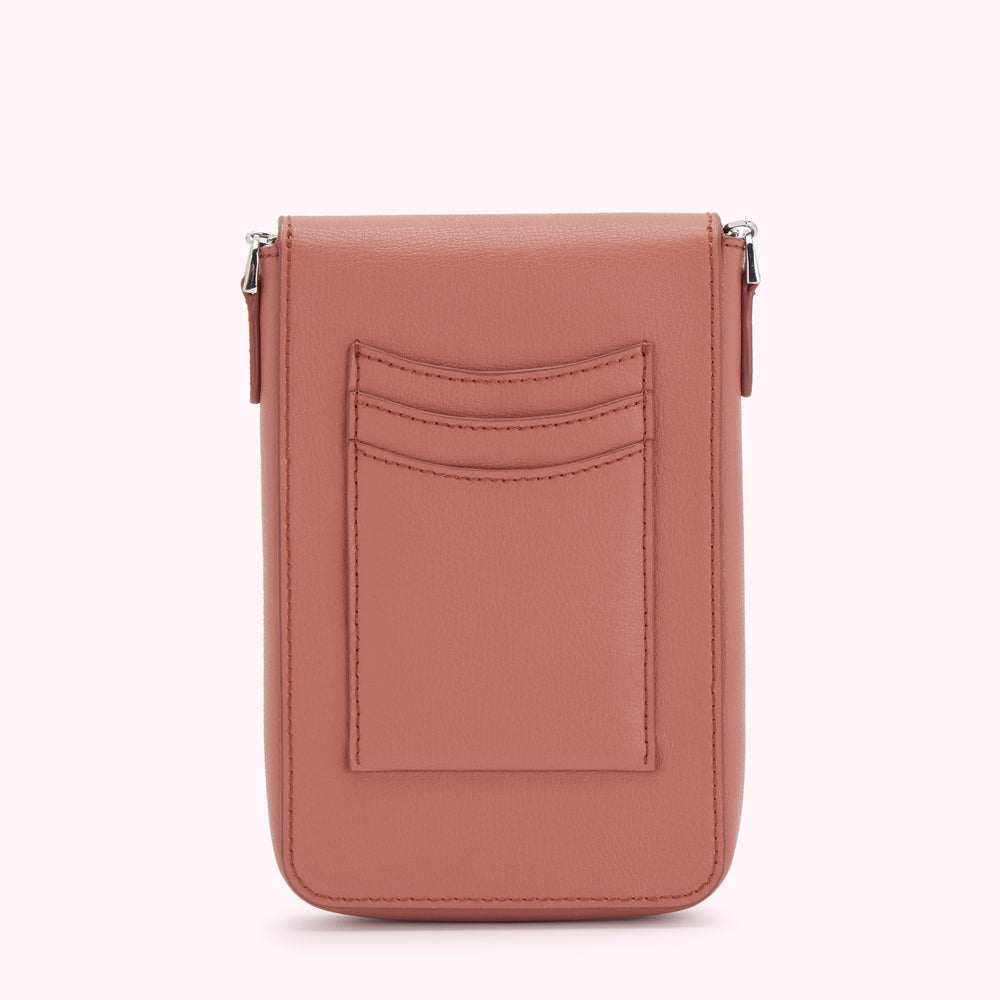Dusty rose leather crossbody bag with back pocket and silver zipper.
