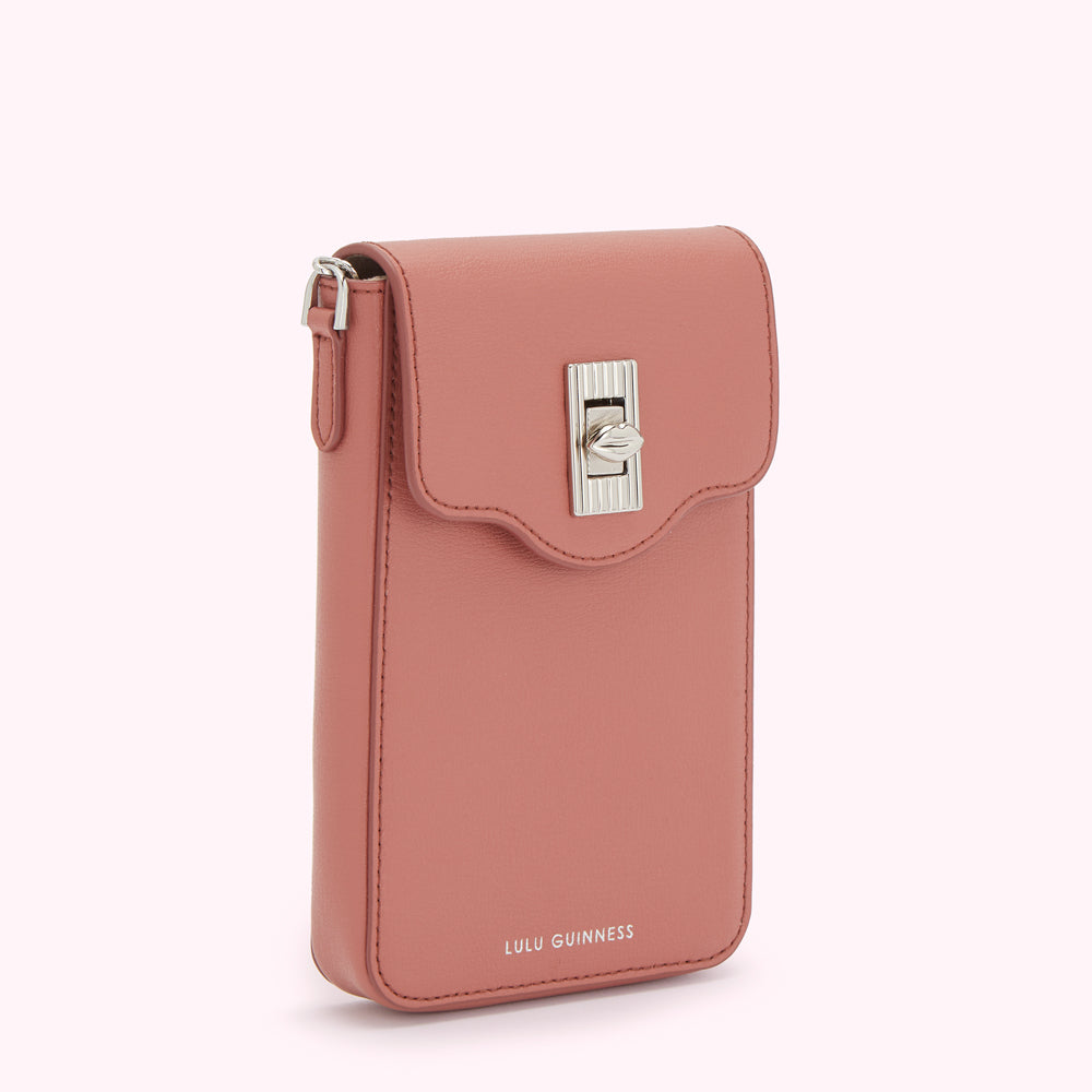 Dusty rose Lulu Guinness crossbody phone bag with silver clasp.
