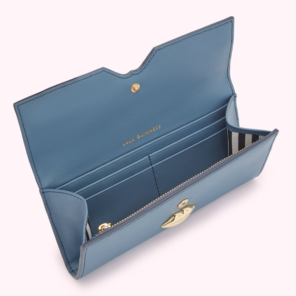 Open blue leather Lulu Guinness wallet with gold lip clasp.