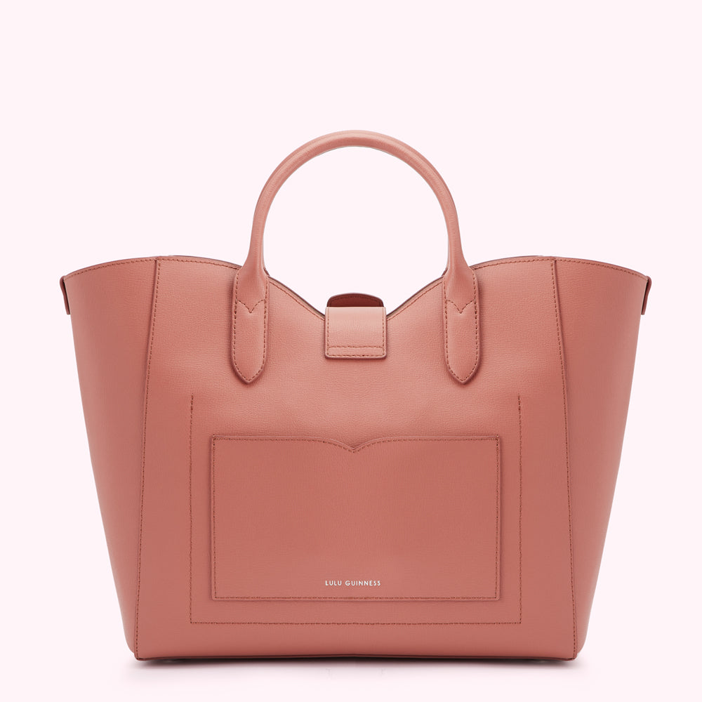 Dusty rose Lulu Guinness tote bag with a front pocket and top handles.

