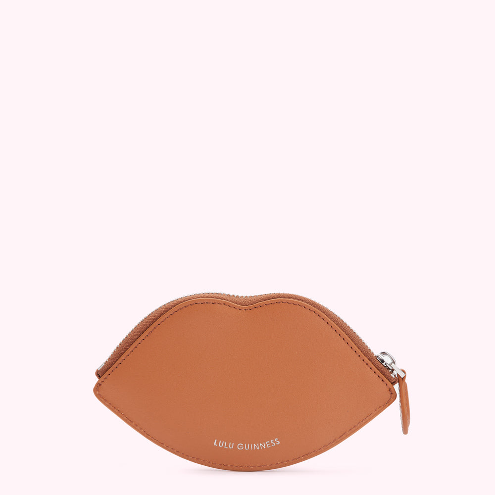 Tan leather lip-shaped coin purse with zipper and Lulu Guinness logo.
