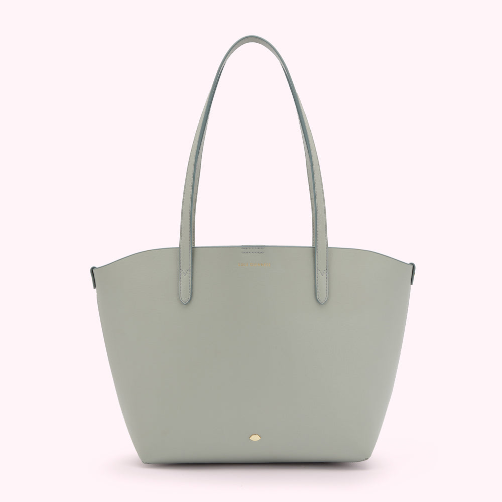 Sage green leather tote bag with light gold logo.
