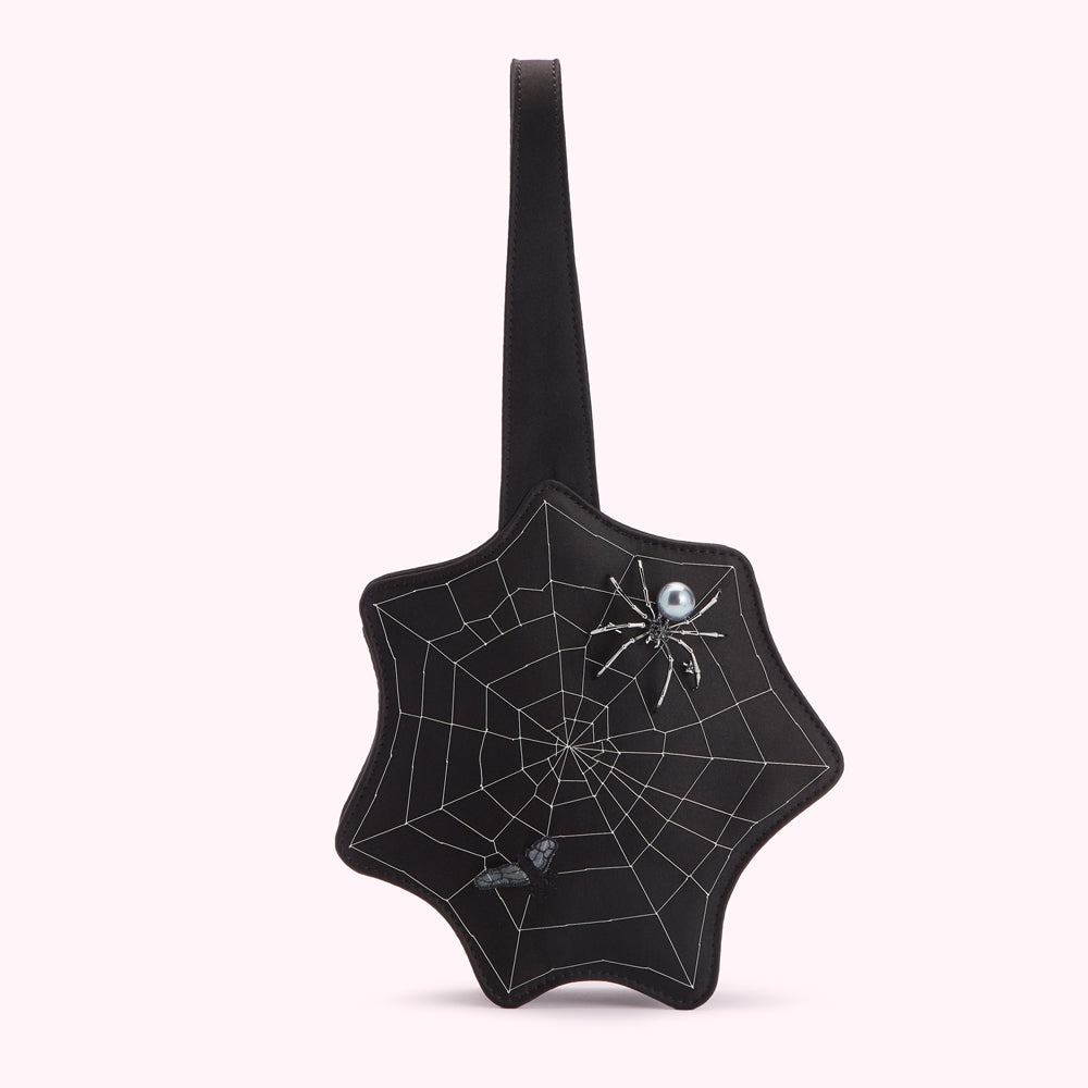 Black web-shaped bag with spiderweb design and spider and fly embellishments.