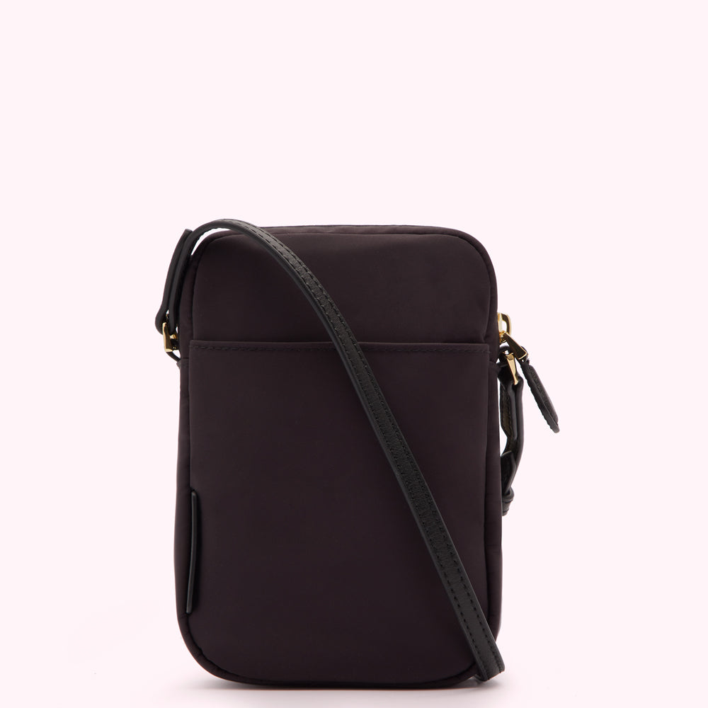 Dark purple crossbody bag with black strap and gold zipper.
