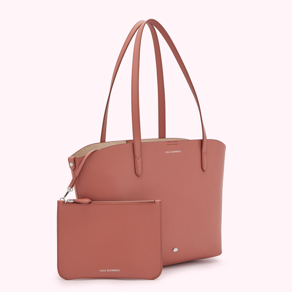Dusty rose Lulu Guinness tote bag and matching zip pouch.