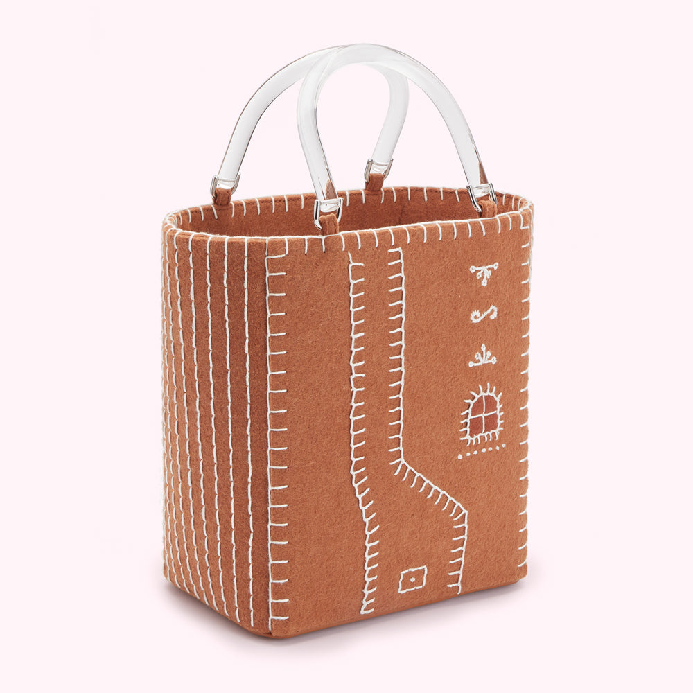 Brown felt tote bag with clear handles and white stitching detailing.