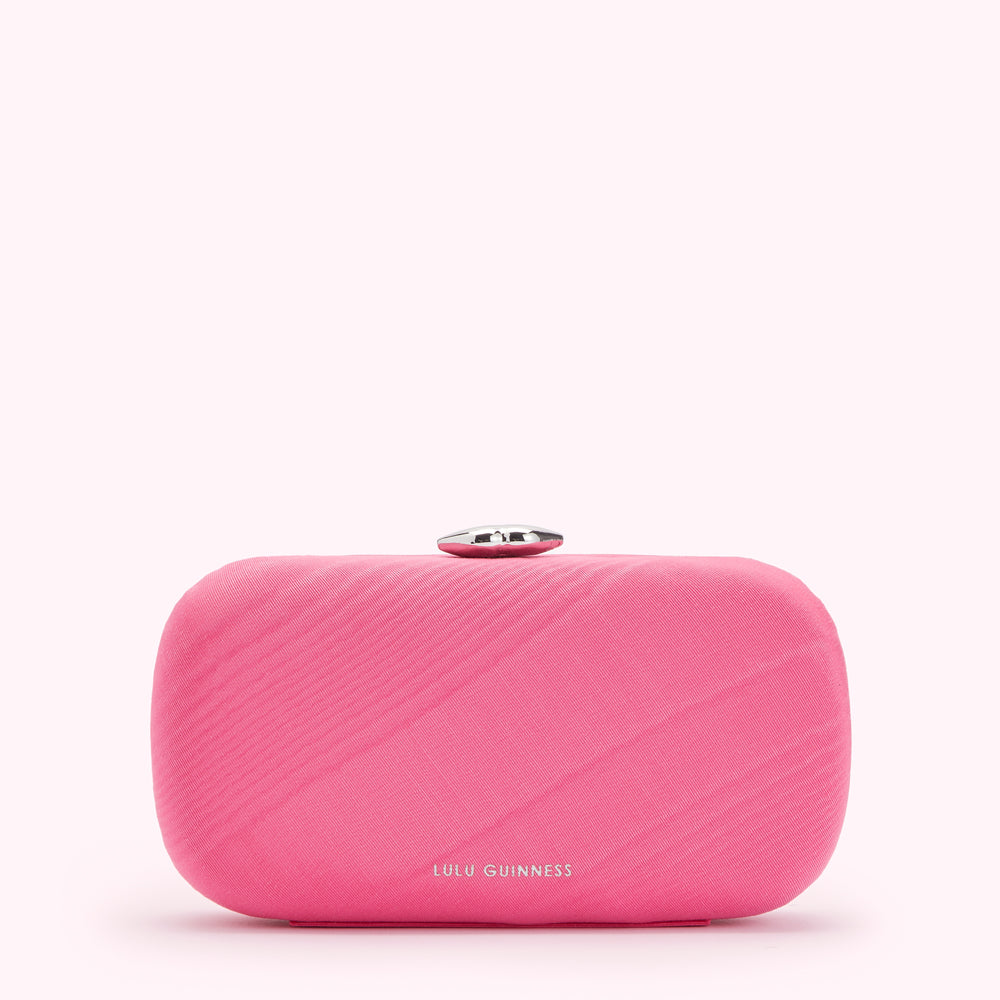 Pink Lulu Guinness clutch with silver clasp.
